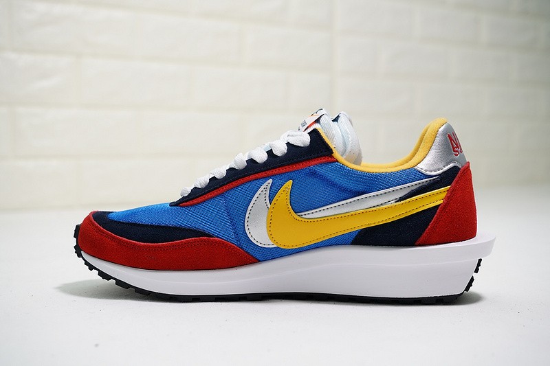 red blue and yellow nike shoes